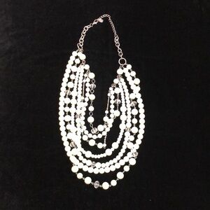 Multi strand faux Pearl and crystal bead necklace.